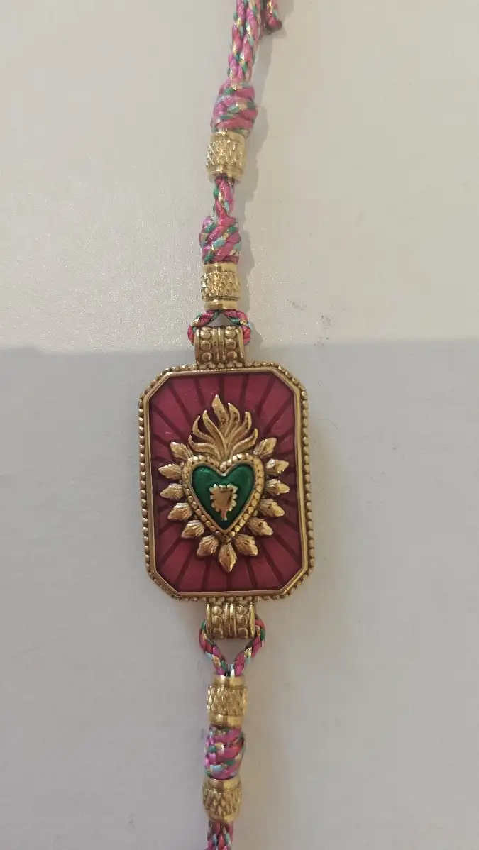 Bracelet cordon et  plaque coeur rose